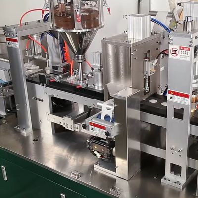 Macchina avanzata di sigillamento per il riempimento di capsule di caffè per stazione di carico di capsule verticali